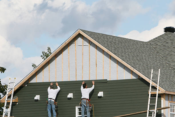 Professional Emergency Siding Repair technician working in Louisville, CO
